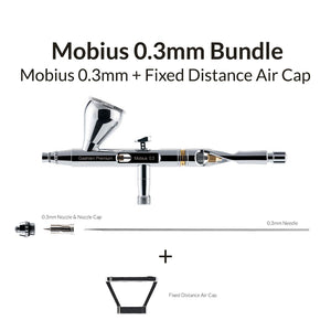 The image shows a Gaahleri Mobius 0.3mm + Distance Air Cap Bundle, which includes an airbrush with a fixed distance air cap and a replacement nozzle.